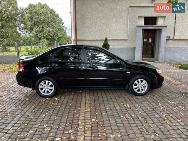 Черный Киа Черато, объемом двигателя 1.98 л и пробегом 265 тыс. км за 5450 $, фото 6 на Automoto.ua