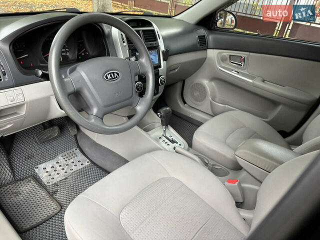 Черный Киа Черато, объемом двигателя 1.98 л и пробегом 265 тыс. км за 5450 $, фото 14 на Automoto.ua