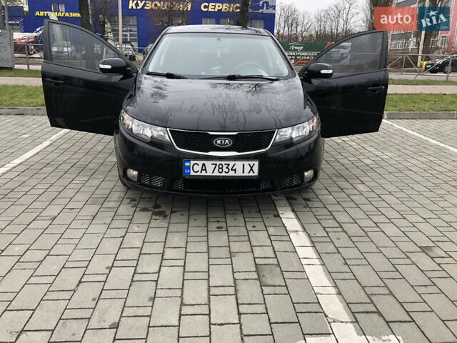 Черный Киа Черато, объемом двигателя 1.59 л и пробегом 260 тыс. км за 5800 $, фото 1 на Automoto.ua