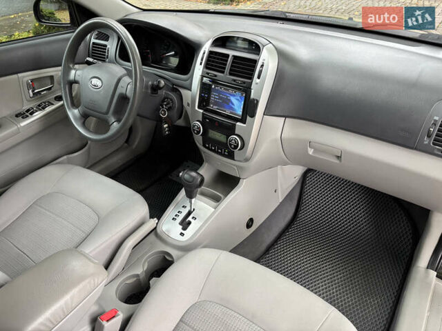 Черный Киа Черато, объемом двигателя 1.98 л и пробегом 265 тыс. км за 5450 $, фото 9 на Automoto.ua