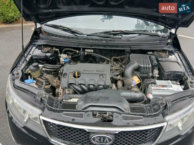 Черный Киа Черато, объемом двигателя 1.6 л и пробегом 253 тыс. км за 5300 $, фото 24 на Automoto.ua