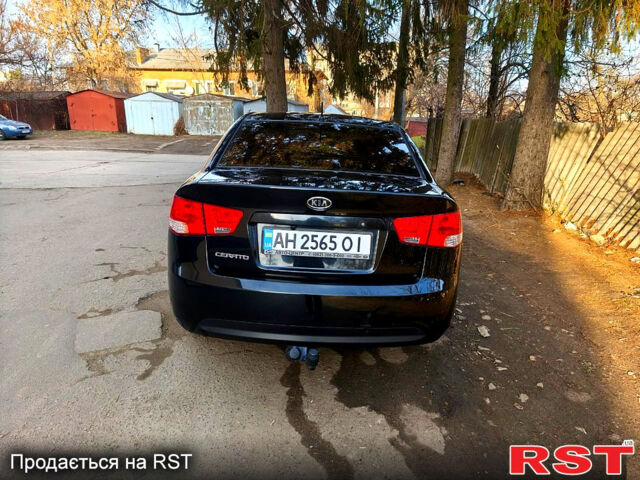 Чорний Кіа Черато, об'ємом двигуна 1.6 л та пробігом 161 тис. км за 7300 $, фото 5 на Automoto.ua