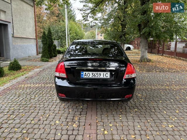 Черный Киа Черато, объемом двигателя 1.98 л и пробегом 265 тыс. км за 5450 $, фото 4 на Automoto.ua