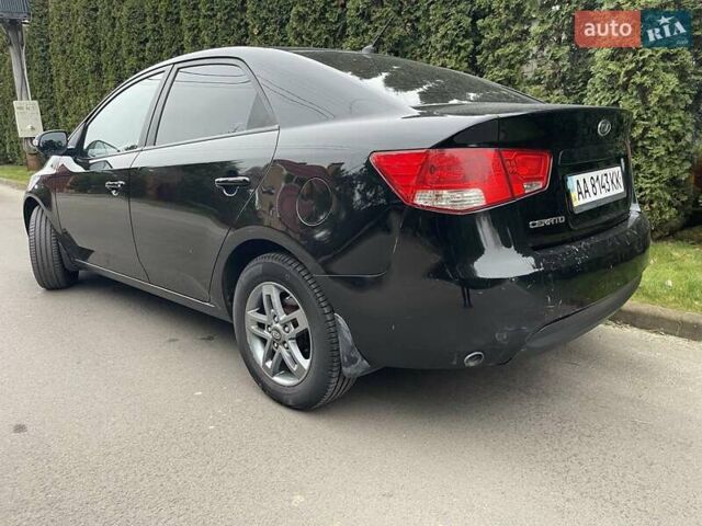 Чорний Кіа Черато, об'ємом двигуна 1.59 л та пробігом 203 тис. км за 6100 $, фото 4 на Automoto.ua