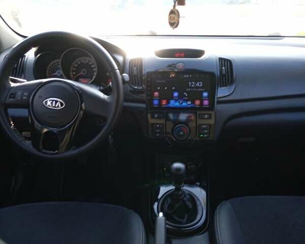 Черный Киа Черато, объемом двигателя 1.6 л и пробегом 173 тыс. км за 6500 $, фото 5 на Automoto.ua