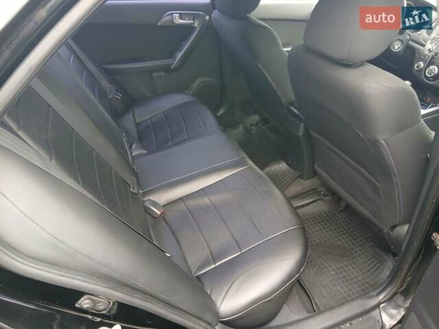 Черный Киа Черато, объемом двигателя 1.6 л и пробегом 253 тыс. км за 5300 $, фото 20 на Automoto.ua