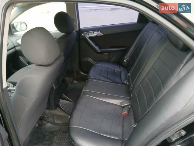 Черный Киа Черато, объемом двигателя 1.59 л и пробегом 253 тыс. км за 5300 $, фото 19 на Automoto.ua