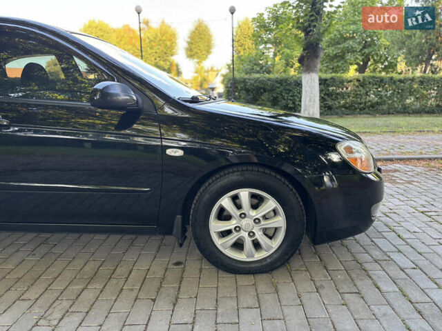 Черный Киа Черато, объемом двигателя 1.98 л и пробегом 264 тыс. км за 5700 $, фото 11 на Automoto.ua
