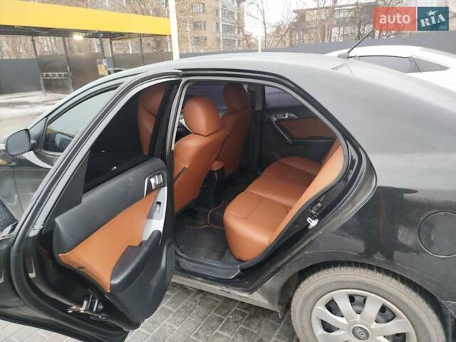 Черный Киа Черато, объемом двигателя 2 л и пробегом 162 тыс. км за 6650 $, фото 3 на Automoto.ua