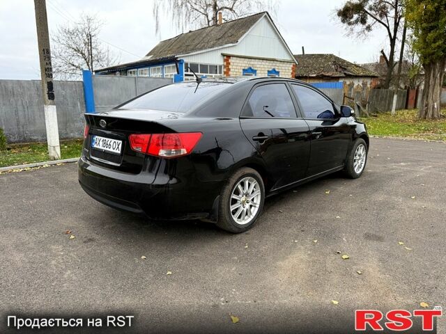 Черный Киа Черато, объемом двигателя 1.6 л и пробегом 200 тыс. км за 5650 $, фото 3 на Automoto.ua