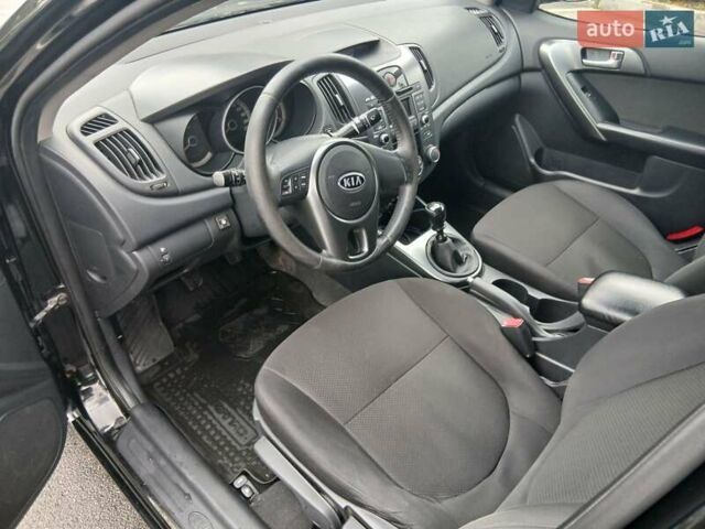 Черный Киа Черато, объемом двигателя 1.6 л и пробегом 253 тыс. км за 5300 $, фото 14 на Automoto.ua