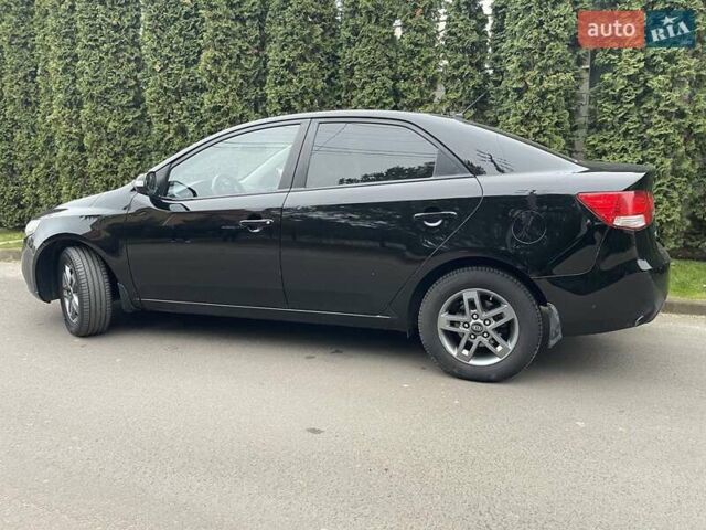 Чорний Кіа Черато, об'ємом двигуна 1.59 л та пробігом 203 тис. км за 6100 $, фото 8 на Automoto.ua