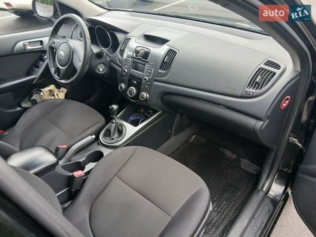 Черный Киа Черато, объемом двигателя 1.6 л и пробегом 253 тыс. км за 5300 $, фото 18 на Automoto.ua