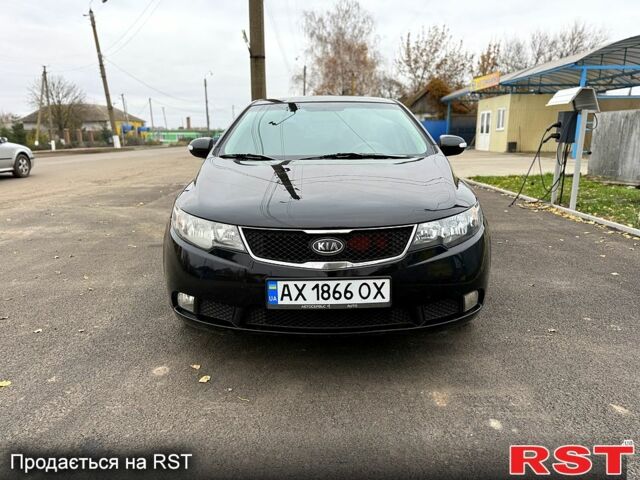 Черный Киа Черато, объемом двигателя 1.6 л и пробегом 200 тыс. км за 5650 $, фото 1 на Automoto.ua