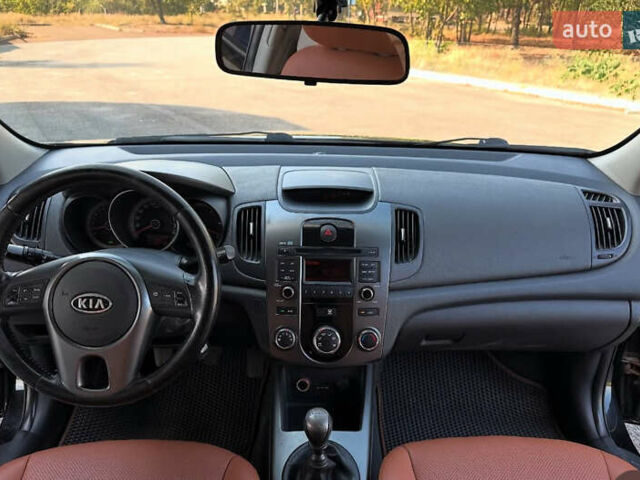 Киа Черато 2009 в Днепре (Днепропетровске) на Automoto.ua Черный Киа Черато, объемом двигателя 2 л и пробегом 162 тыс. км за 5700 $, фото 13 на Automoto.ua