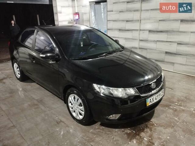 Черный Киа Черато, объемом двигателя 1.59 л и пробегом 180 тыс. км за 6800 $, фото 1 на Automoto.ua