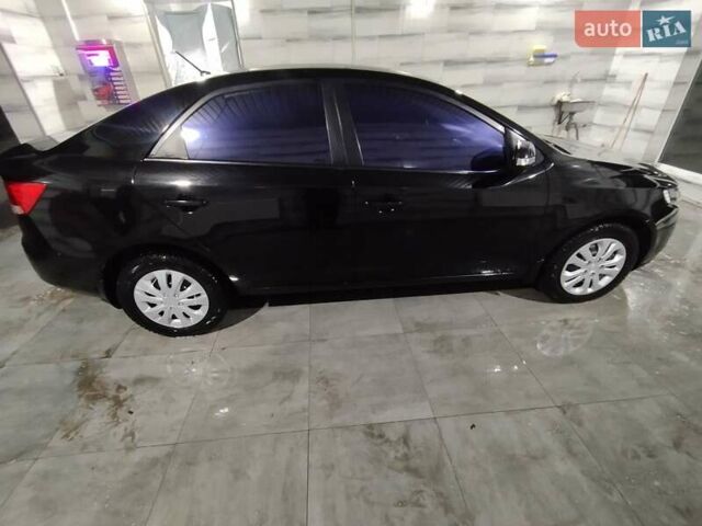 Черный Киа Черато, объемом двигателя 1.59 л и пробегом 180 тыс. км за 6800 $, фото 5 на Automoto.ua