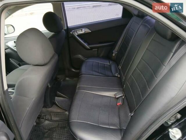 Черный Киа Черато, объемом двигателя 1.59 л и пробегом 253 тыс. км за 5300 $, фото 18 на Automoto.ua