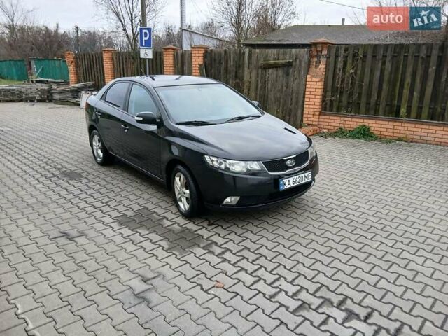 Черный Киа Черато, объемом двигателя 1.59 л и пробегом 253 тыс. км за 5300 $, фото 3 на Automoto.ua