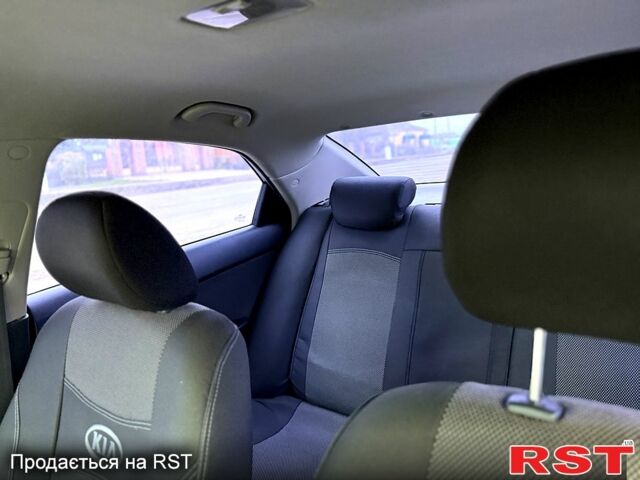 Черный Киа Черато, объемом двигателя 1.6 л и пробегом 200 тыс. км за 5650 $, фото 8 на Automoto.ua