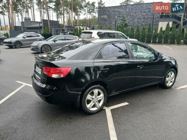 Черный Киа Черато, объемом двигателя 1.6 л и пробегом 253 тыс. км за 5300 $, фото 1 на Automoto.ua