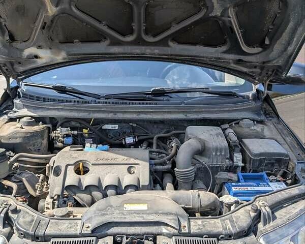 Чорний Кіа Черато, об'ємом двигуна 1.6 л та пробігом 175 тис. км за 7300 $, фото 14 на Automoto.ua