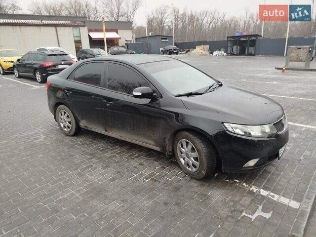 Черный Киа Черато, объемом двигателя 2 л и пробегом 162 тыс. км за 6650 $, фото 1 на Automoto.ua