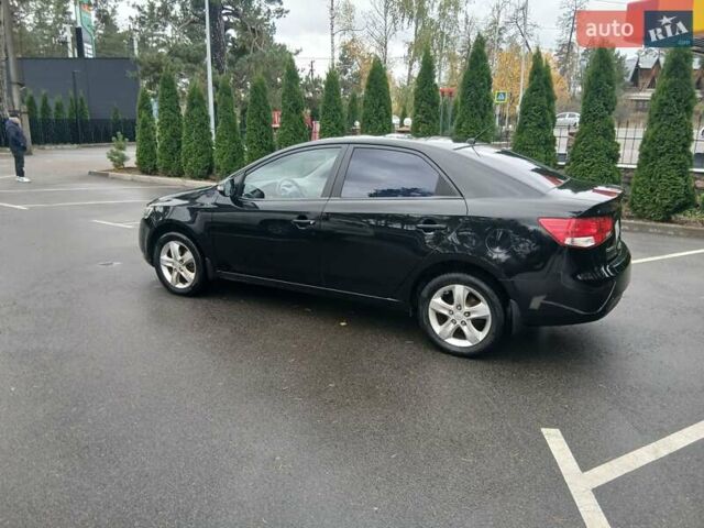 Черный Киа Черато, объемом двигателя 1.6 л и пробегом 253 тыс. км за 5300 $, фото 2 на Automoto.ua