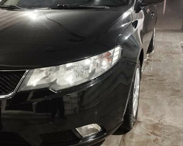 Черный Киа Черато, объемом двигателя 1.59 л и пробегом 180 тыс. км за 6800 $, фото 10 на Automoto.ua