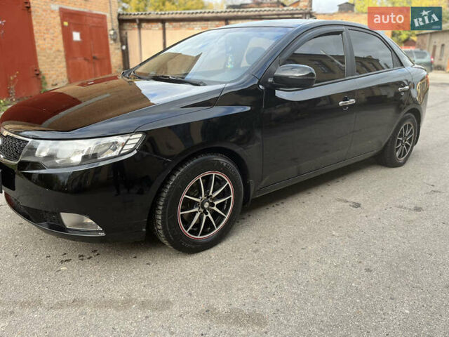 Черный Киа Черато, объемом двигателя 1.98 л и пробегом 166 тыс. км за 7500 $, фото 1 на Automoto.ua
