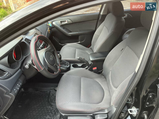 Черный Киа Черато, объемом двигателя 1.98 л и пробегом 166 тыс. км за 7500 $, фото 11 на Automoto.ua