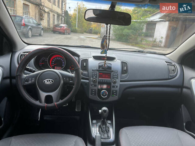 Черный Киа Черато, объемом двигателя 1.98 л и пробегом 166 тыс. км за 7500 $, фото 10 на Automoto.ua
