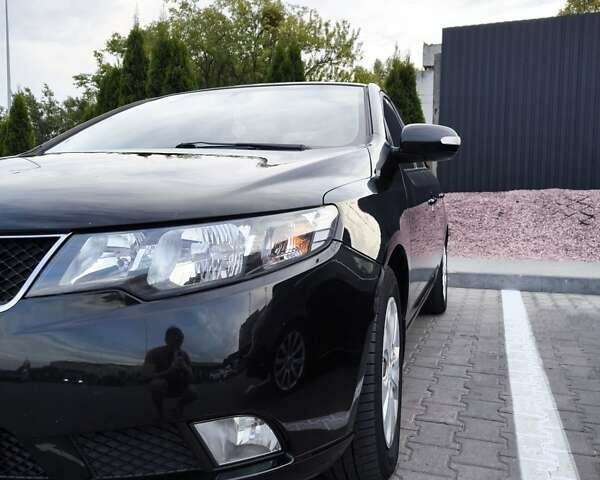 Черный Киа Черато, объемом двигателя 1.59 л и пробегом 164 тыс. км за 7500 $, фото 3 на Automoto.ua
