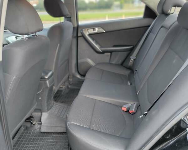 Черный Киа Черато, объемом двигателя 1.59 л и пробегом 164 тыс. км за 7500 $, фото 11 на Automoto.ua