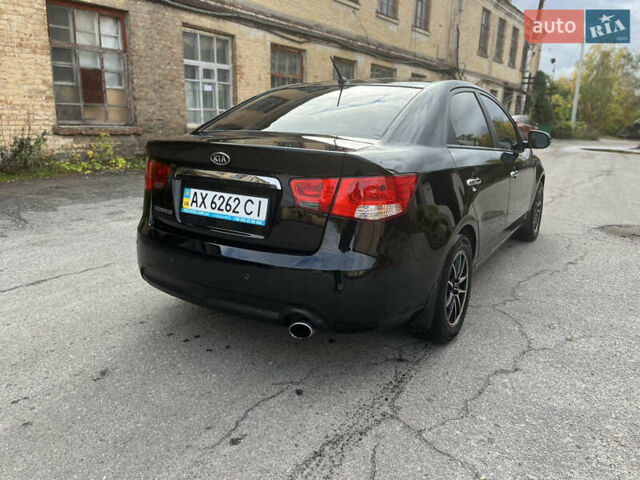 Черный Киа Черато, объемом двигателя 1.98 л и пробегом 166 тыс. км за 7500 $, фото 6 на Automoto.ua