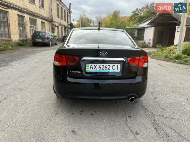 Черный Киа Черато, объемом двигателя 1.98 л и пробегом 166 тыс. км за 7500 $, фото 7 на Automoto.ua