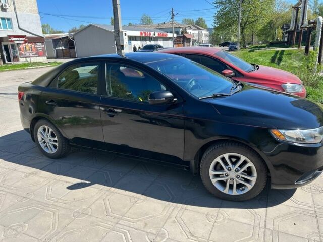 Черный Киа Черато, объемом двигателя 2 л и пробегом 203 тыс. км за 9000 $, фото 1 на Automoto.ua