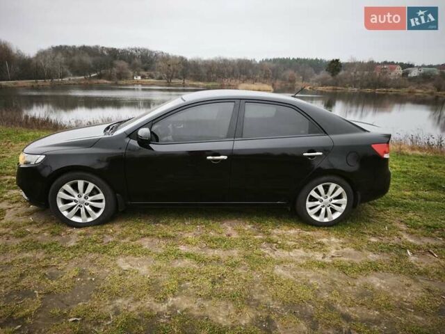 Черный Киа Черато, объемом двигателя 2 л и пробегом 96 тыс. км за 8500 $, фото 2 на Automoto.ua
