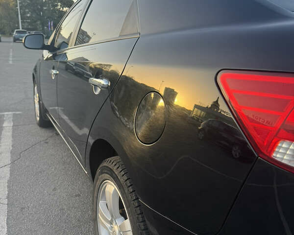 Черный Киа Черато, объемом двигателя 2 л и пробегом 183 тыс. км за 8299 $, фото 7 на Automoto.ua