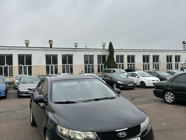 Черный Киа Черато, объемом двигателя 2 л и пробегом 300 тыс. км за 5499 $, фото 1 на Automoto.ua