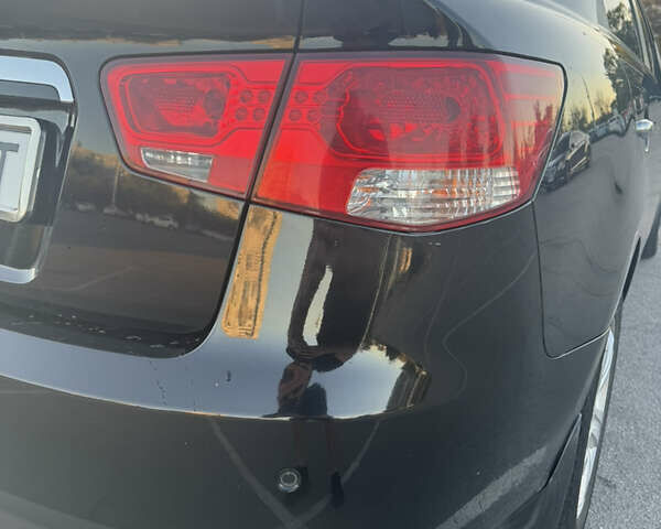 Черный Киа Черато, объемом двигателя 2 л и пробегом 183 тыс. км за 8299 $, фото 4 на Automoto.ua