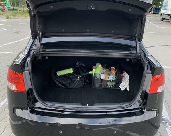 Черный Киа Черато, объемом двигателя 2 л и пробегом 175 тыс. км за 9400 $, фото 14 на Automoto.ua