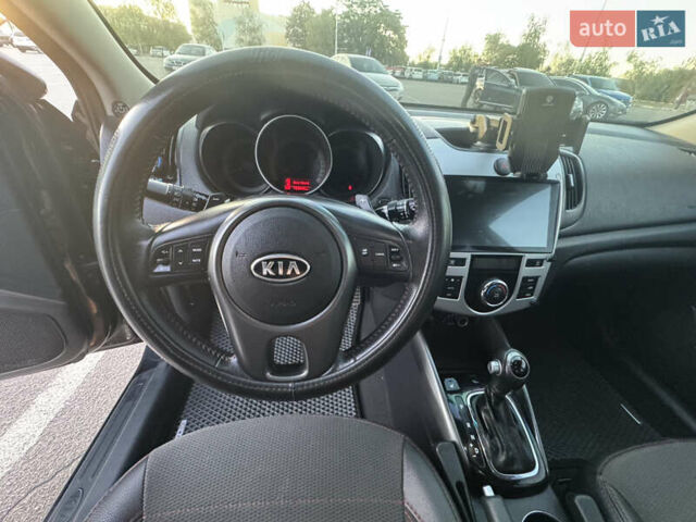 Черный Киа Черато, объемом двигателя 2 л и пробегом 183 тыс. км за 8299 $, фото 15 на Automoto.ua