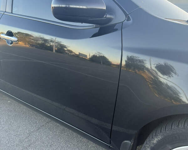 Черный Киа Черато, объемом двигателя 2 л и пробегом 183 тыс. км за 8299 $, фото 3 на Automoto.ua