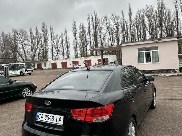 Черный Киа Черато, объемом двигателя 2 л и пробегом 300 тыс. км за 5499 $, фото 3 на Automoto.ua