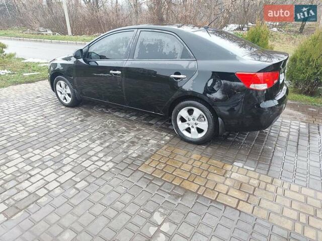 Черный Киа Черато, объемом двигателя 2 л и пробегом 227 тыс. км за 6100 $, фото 9 на Automoto.ua