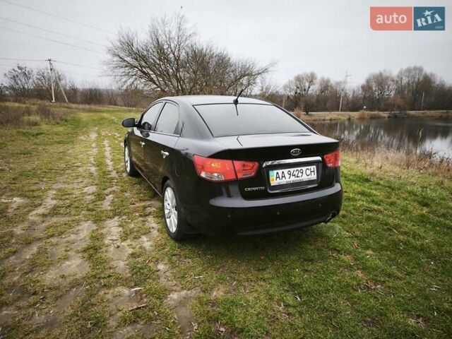 Черный Киа Черато, объемом двигателя 2 л и пробегом 96 тыс. км за 8500 $, фото 1 на Automoto.ua