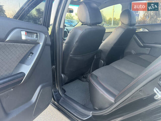 Черный Киа Черато, объемом двигателя 2 л и пробегом 183 тыс. км за 8299 $, фото 11 на Automoto.ua