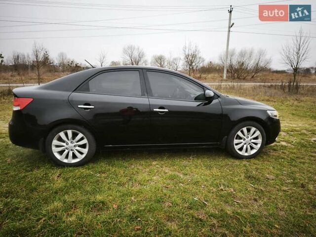 Черный Киа Черато, объемом двигателя 2 л и пробегом 96 тыс. км за 8500 $, фото 5 на Automoto.ua