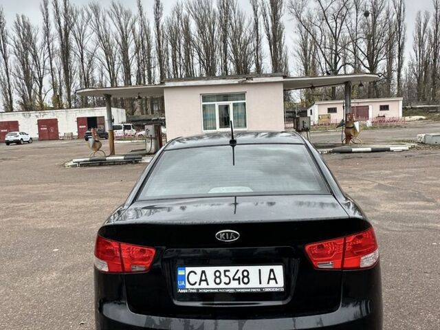 Черный Киа Черато, объемом двигателя 2 л и пробегом 300 тыс. км за 5499 $, фото 4 на Automoto.ua